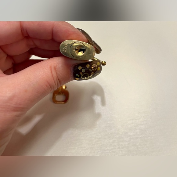 Authentic Louis Vuitton padlocks with single key. 302 and 320 are sold. - Picture 4 of 4
